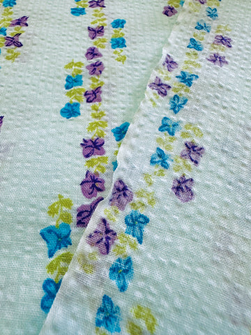 Vintage Fabric 1960s Small Retro Flowers on Pale Blue Cotton Plisse 88cm Wide