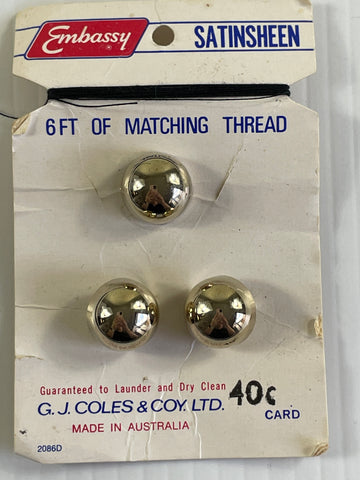 ONE SET ONLY: vintage 1970s high gold dome shank buttons on card 13mm